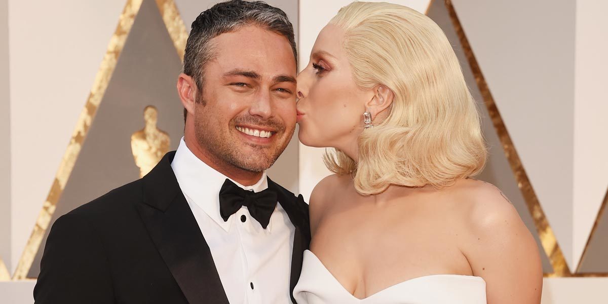 Lady Gaga arrives at 2016 Oscars with fiancé Taylor Kinney